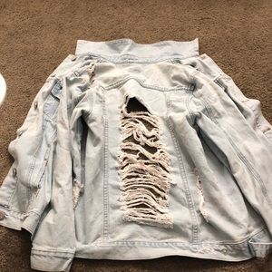 Super distressed denim jacket